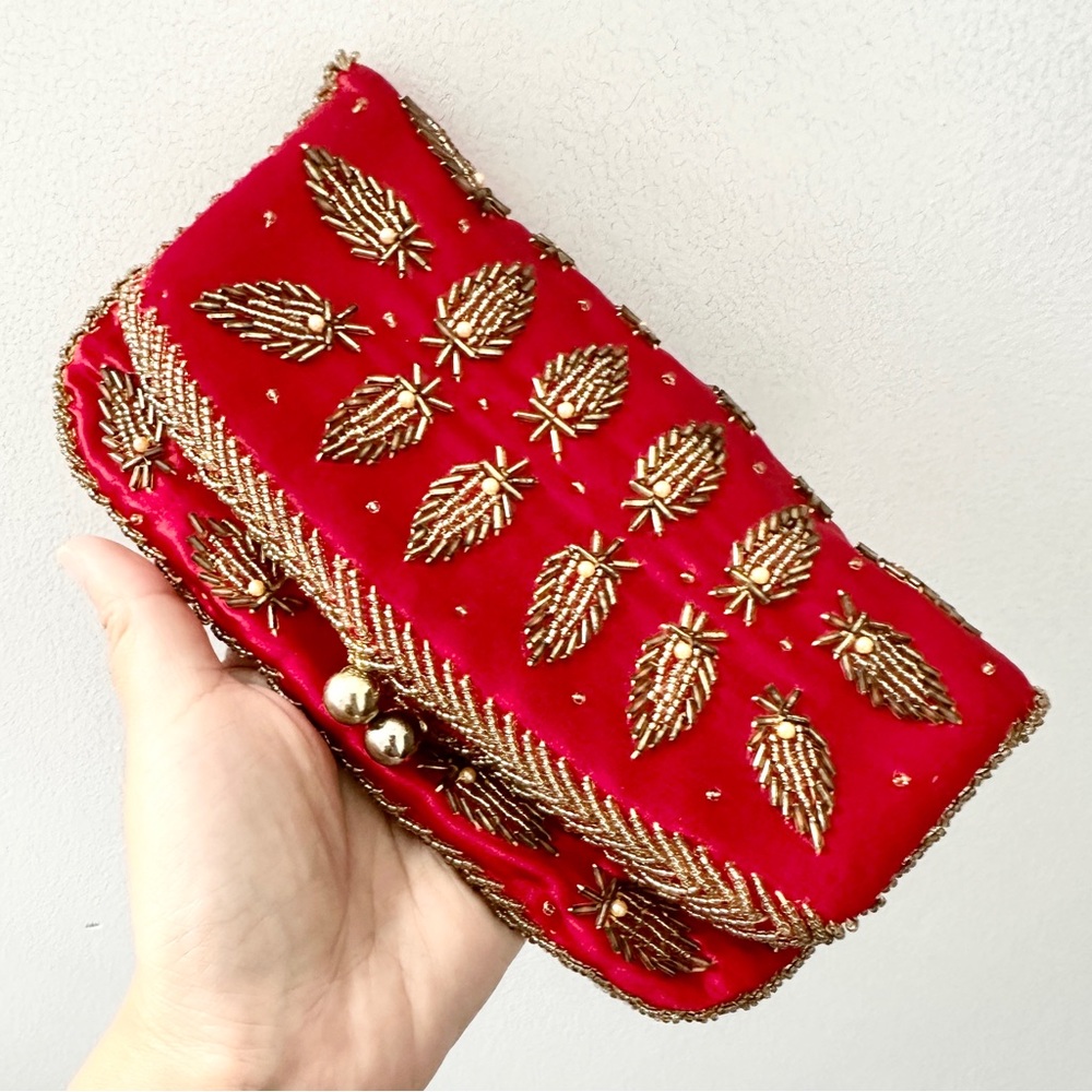 Elegant Red and Gold Embellished Clutch